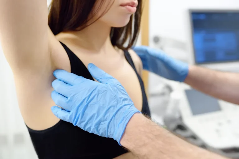Doctor mammologist examines woman breasts and lymph nodes. Correcting the shape of the breast - lift, reduction, reconstruction, augmentation. Problems of lactation. Breast cancer.